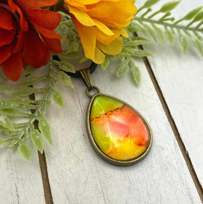 Hand Painted Glass Cabochon Teardrop Pendant. Green/ Orange and Yellow